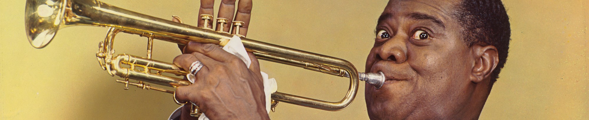 Hør den musikalske fortælling om Louis Armstrong - fra fattig dreng til verdensstjerne