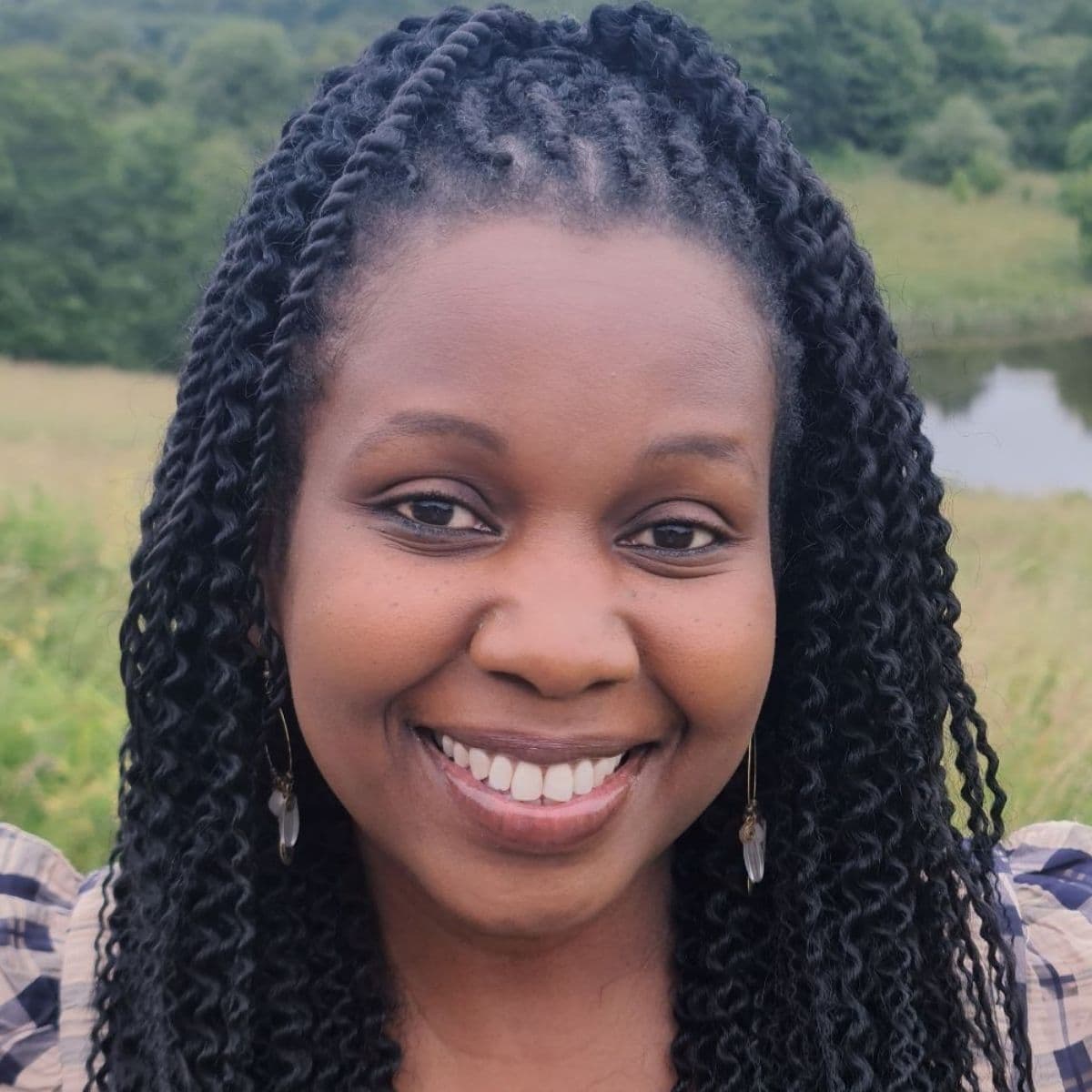 Hovedet i himlen og fødderne på jorden med Carolyne Kaddu Rasmussen