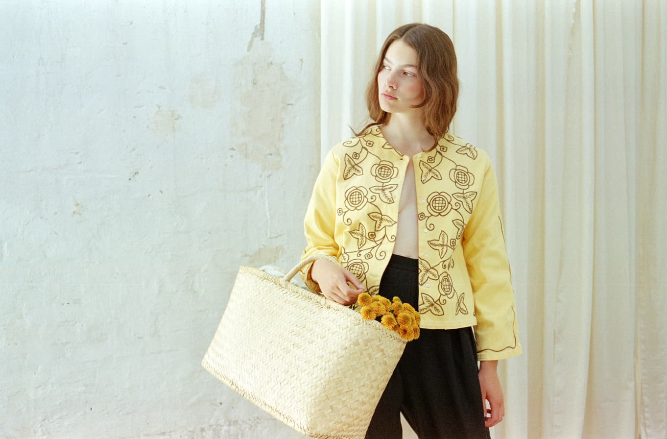 Student creating sustainable clothing through upcycling and natural dyeing