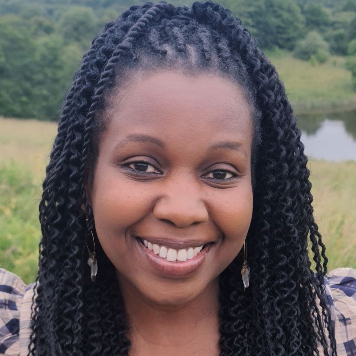 Hovedet i himlen og fødderne på jorden med Carolyne Kaddu Rasmussen