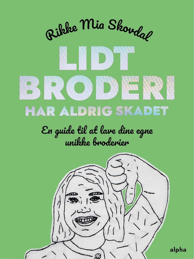"Bogforside med titlen Lidt Broderi har aldrig skadet"