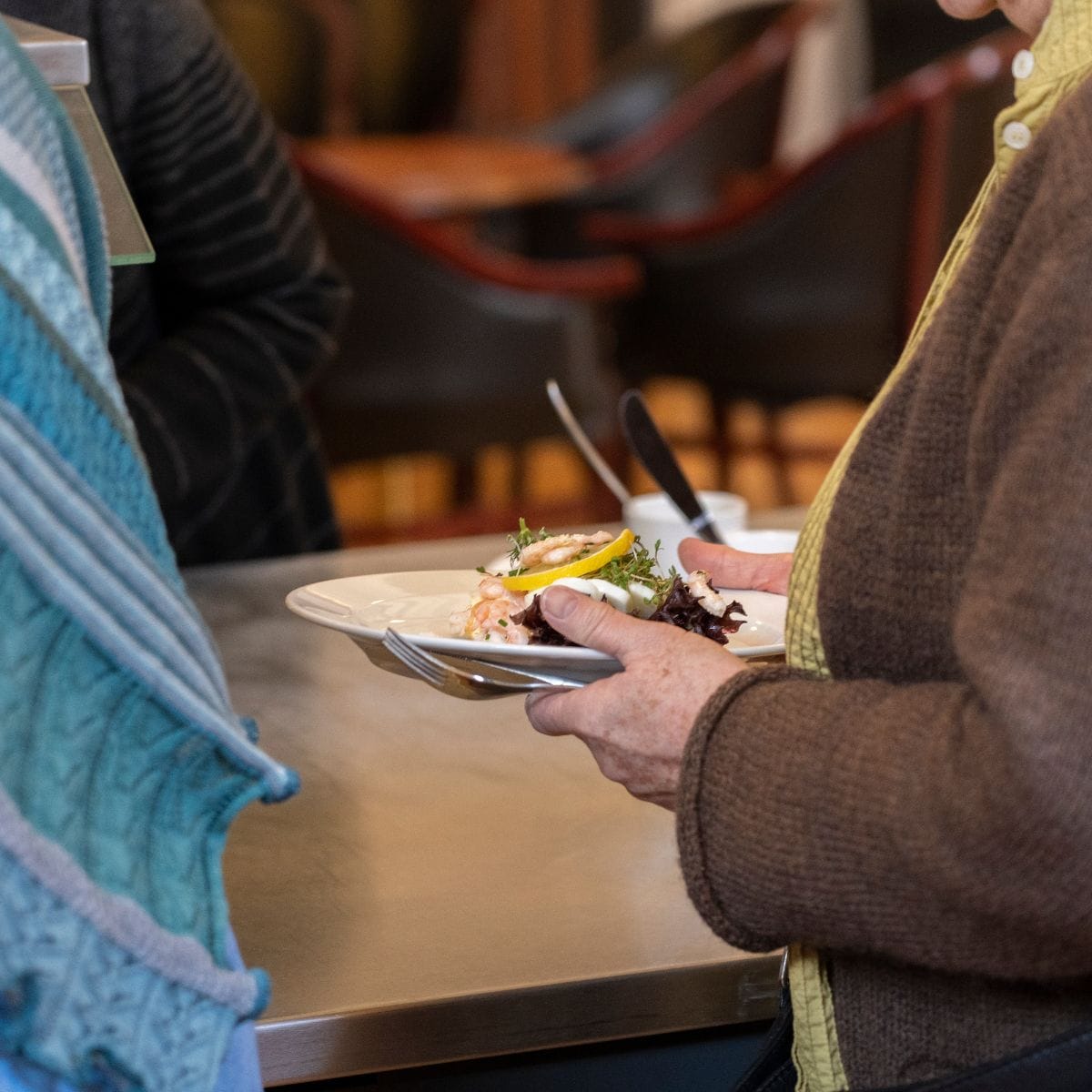 Smørrebrød på en persons tallerken til fællessang på FOF Aftenskolen Aarhus