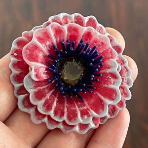 Broche formet i voks