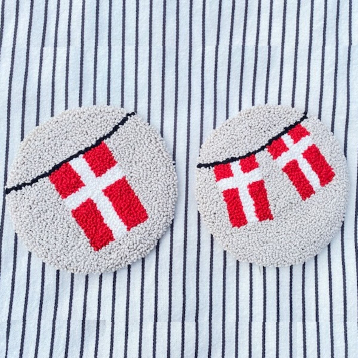 Flag ikoner lavet med puch needle